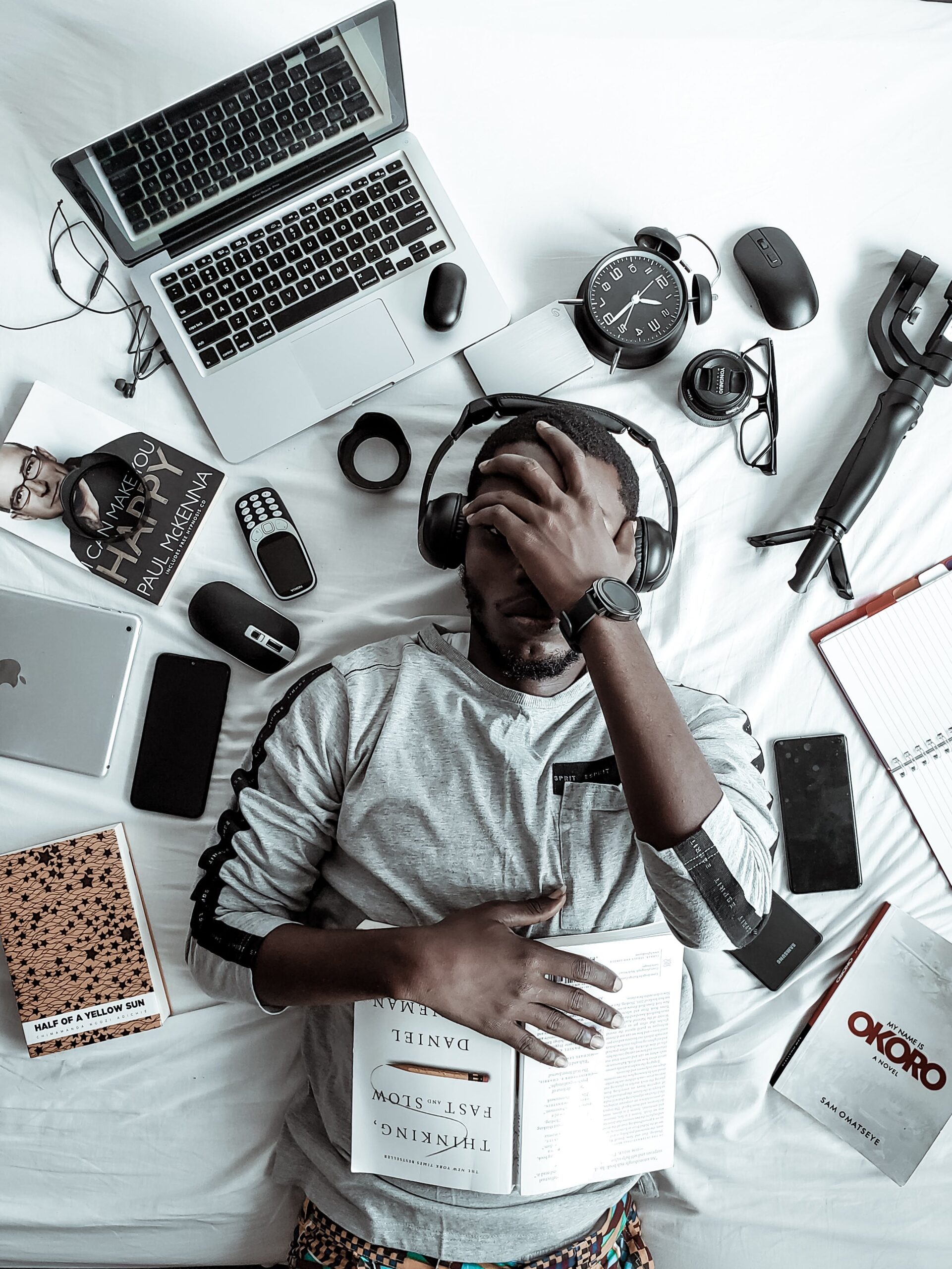 stressed man lying down thinking